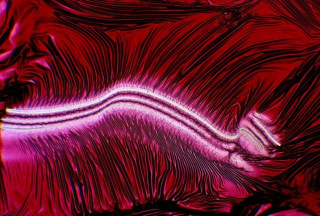 red ink mixed with acid, heated